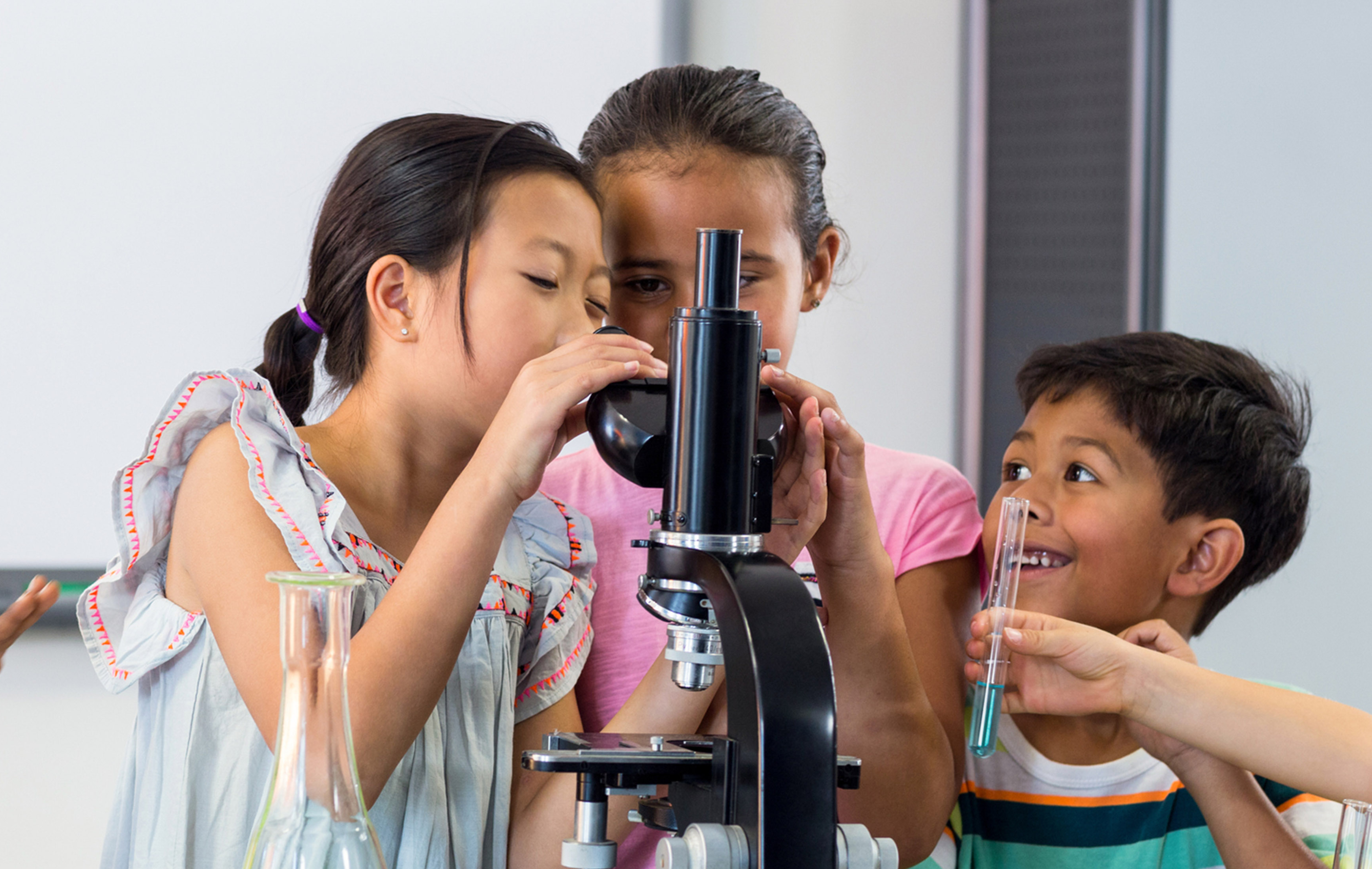 Children Looking through Microscope - Science